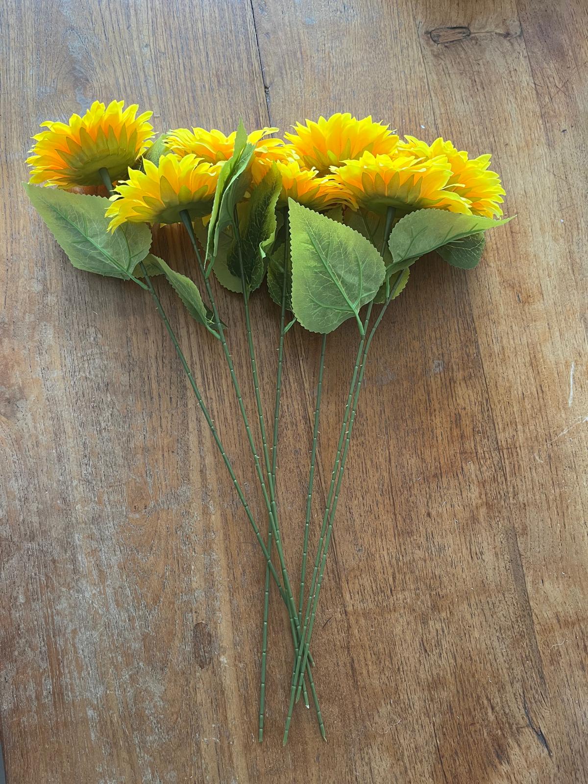 Zonnebloem met vaas